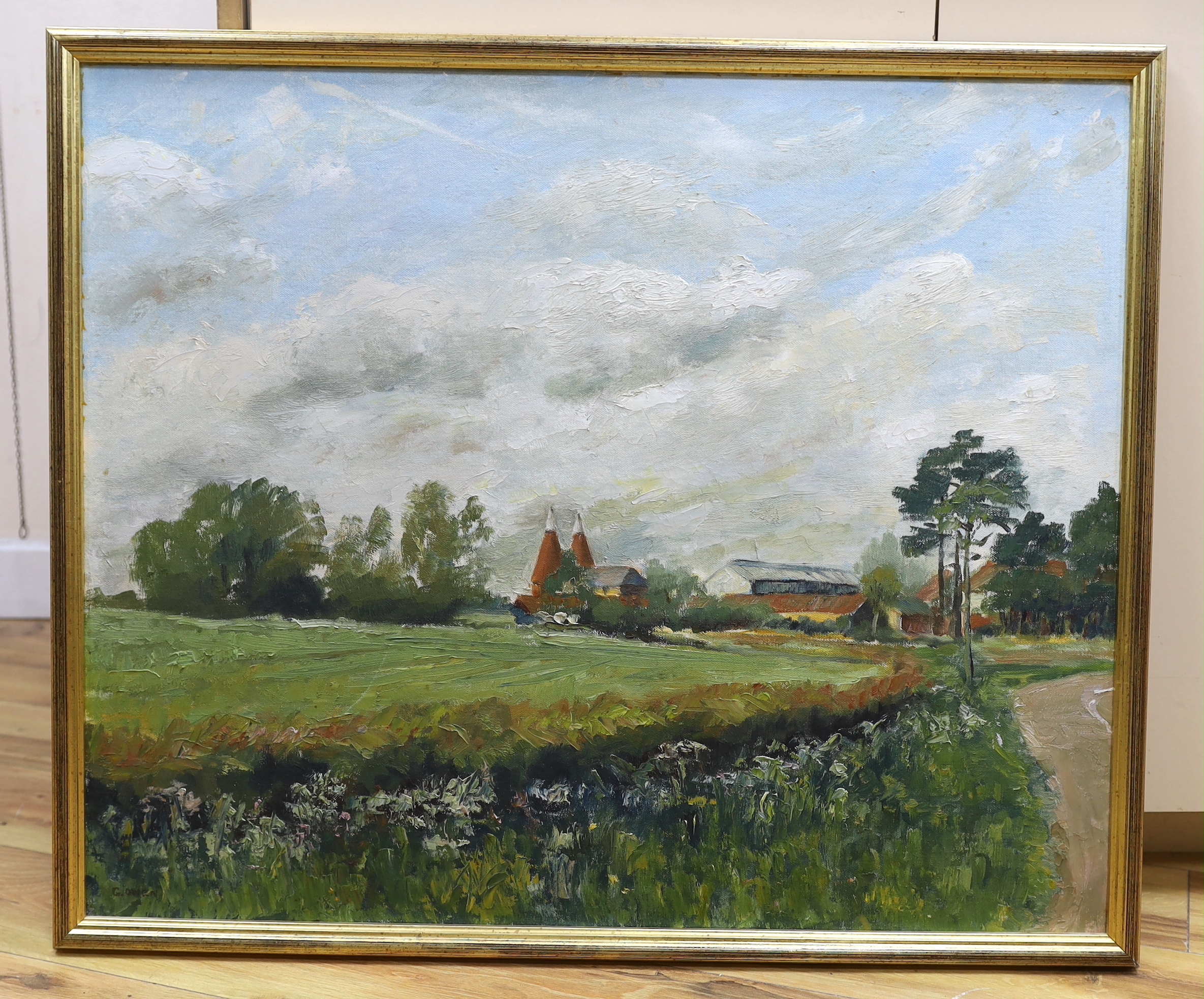 G. Owen (20th. C) oil on canvas board, Landscape with oast house, signed, 62 x 75cm